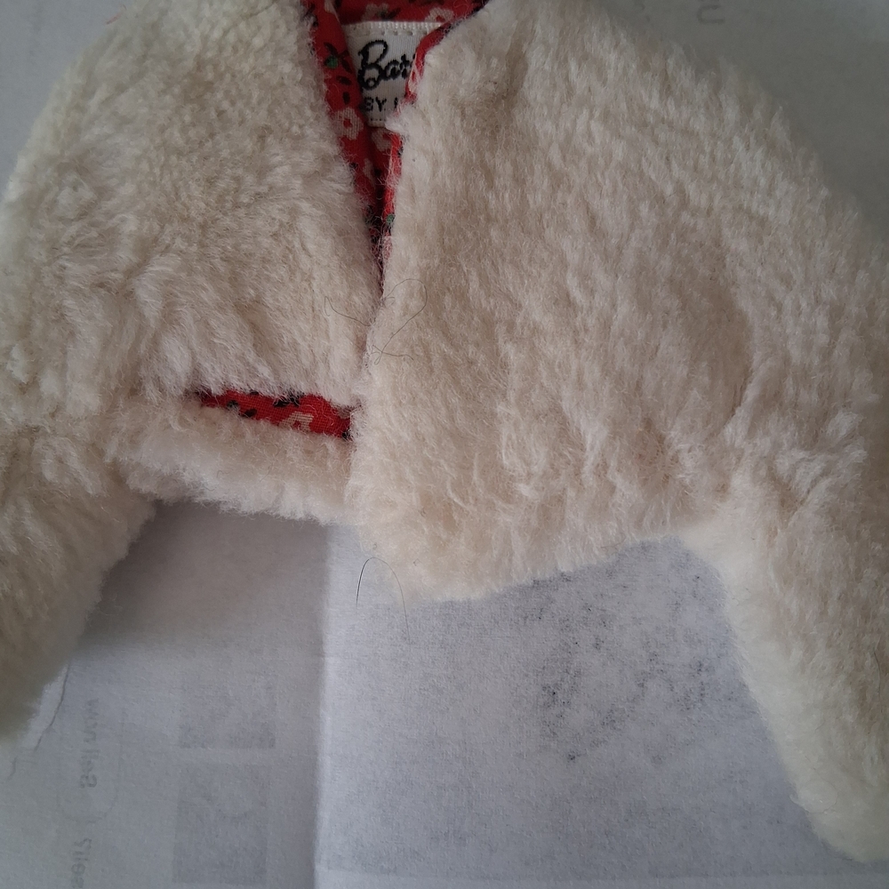 Vintage Barbie "Ice Breaker" white furry jacket.